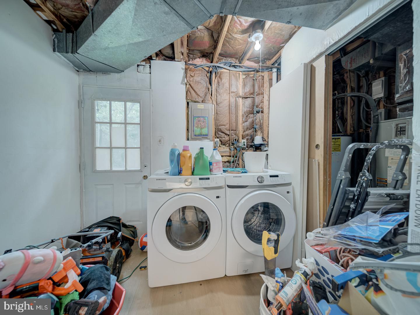 10397 Blue Arrow Court Columbia, MD 21044 - Photo 9 of 43 a utility room with dryer and washer