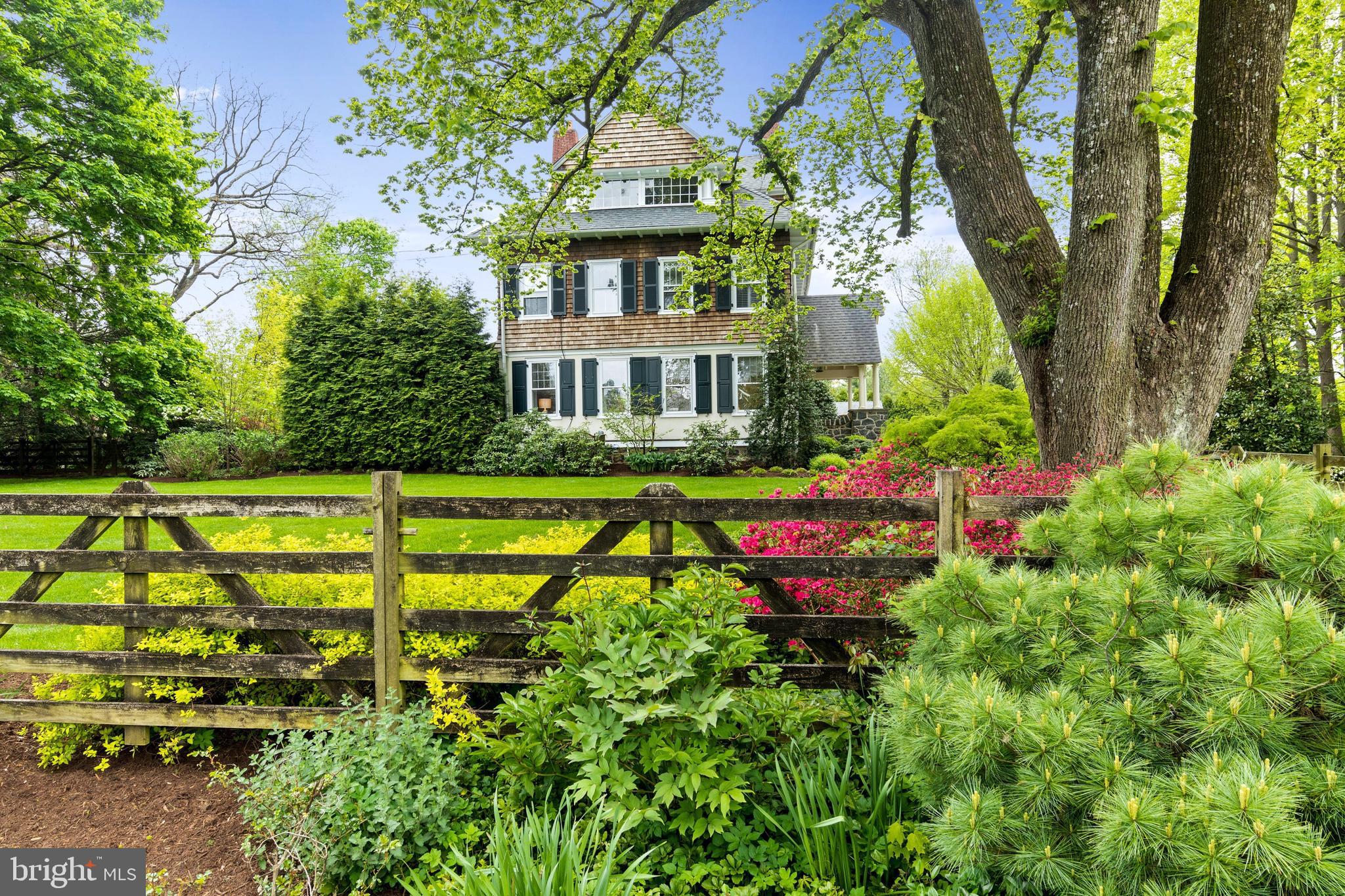512 Dorset Road Devon, PA 19333 - Photo 2 of 48 a view of a house with a swimming pool