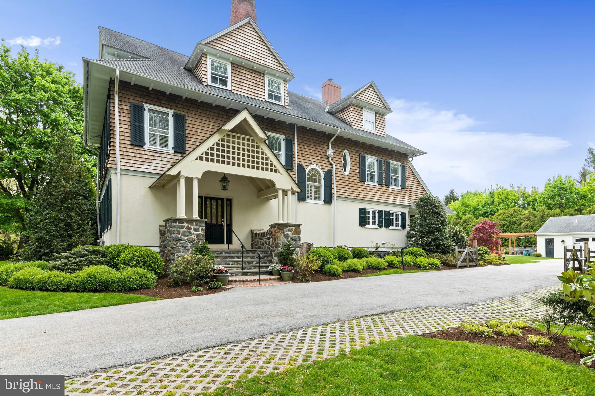 512 Dorset Road Devon, PA 19333 - Photo 3 of 48 a front view of a house with a yard