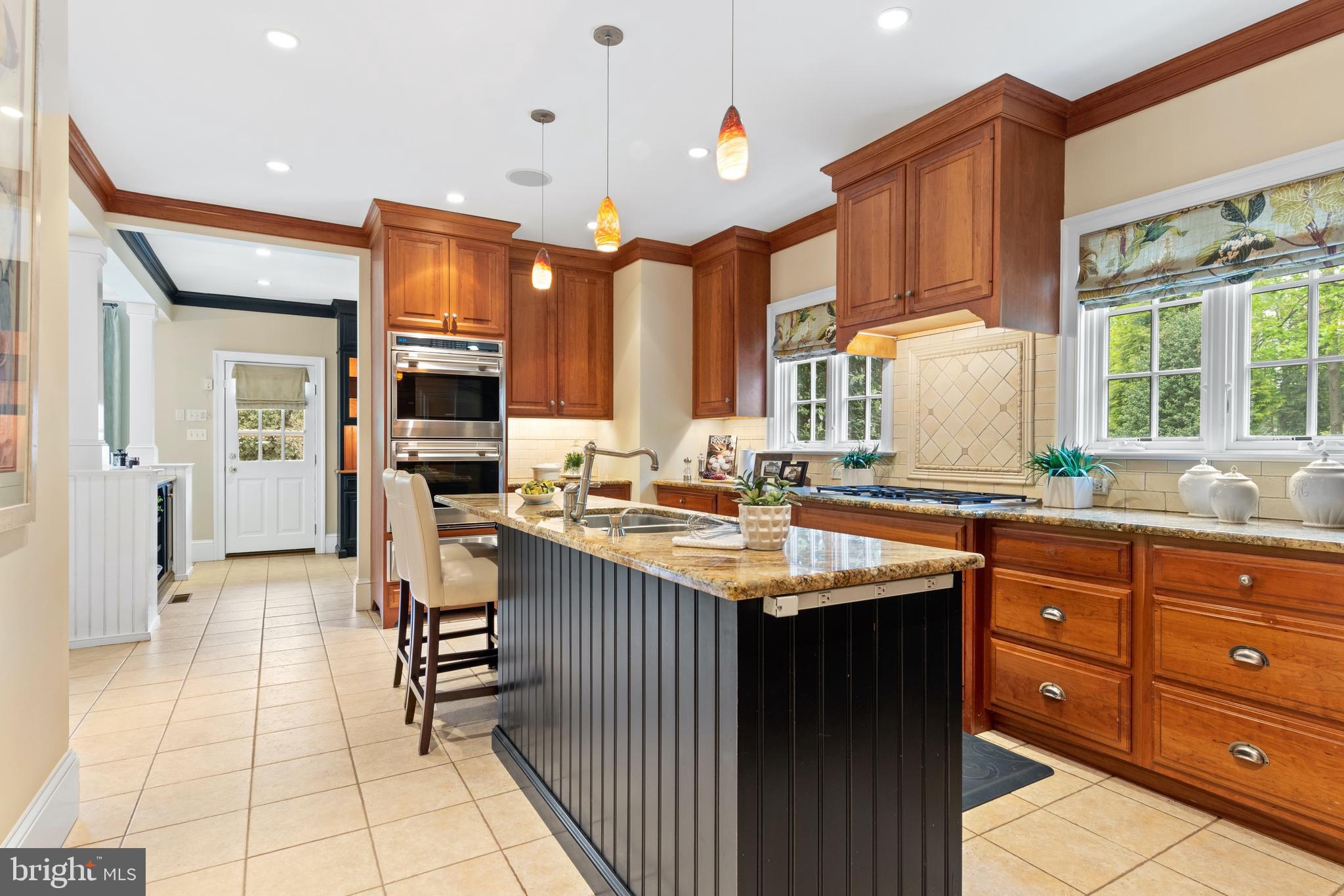 512 Dorset Road Devon, PA 19333 - Photo 25 of 48 a kitchen with a sink stove and cabinets