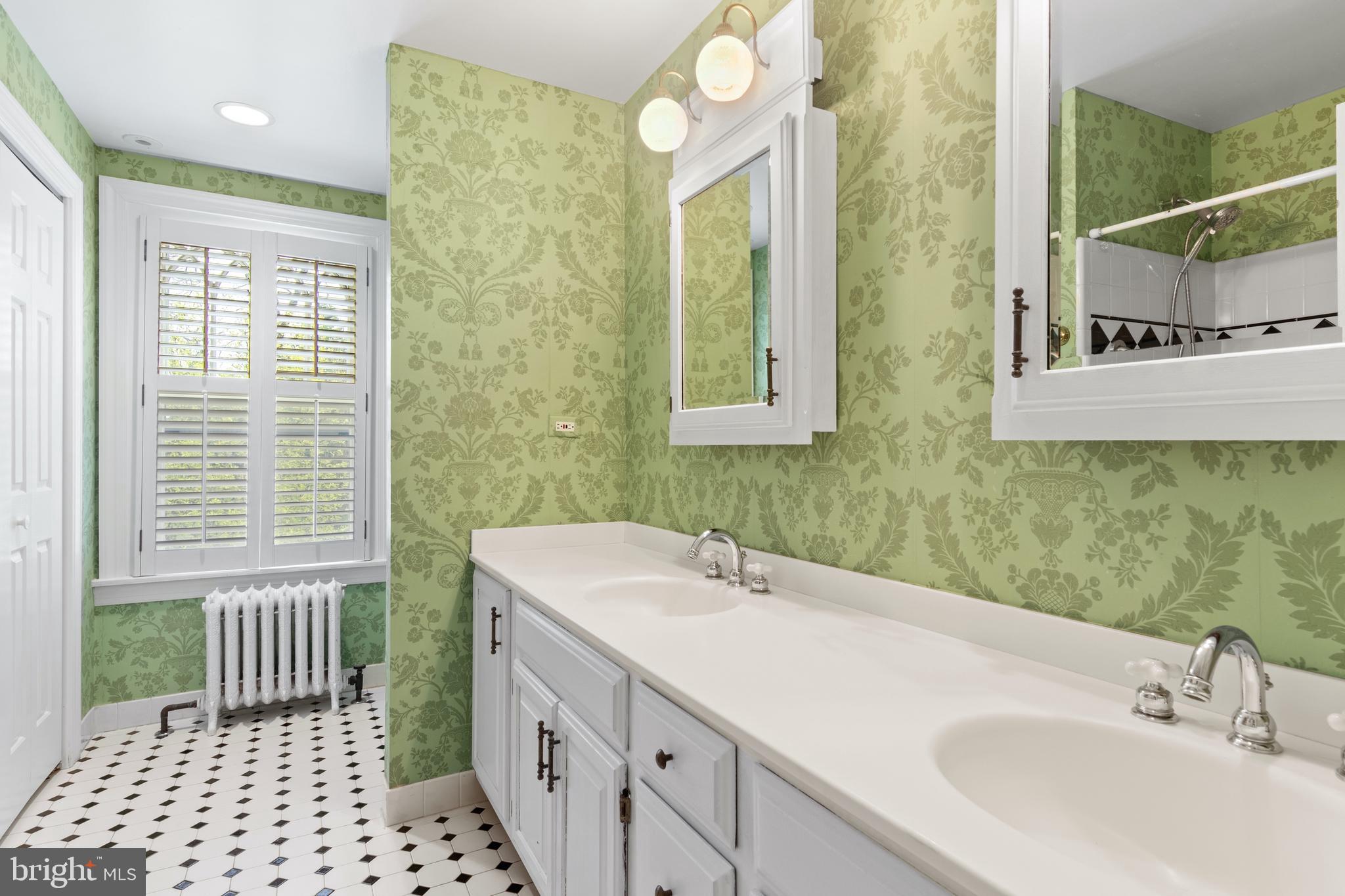 512 Dorset Road Devon, PA 19333 - Photo 40 of 48 a bathroom with a sink a toilet and a mirror