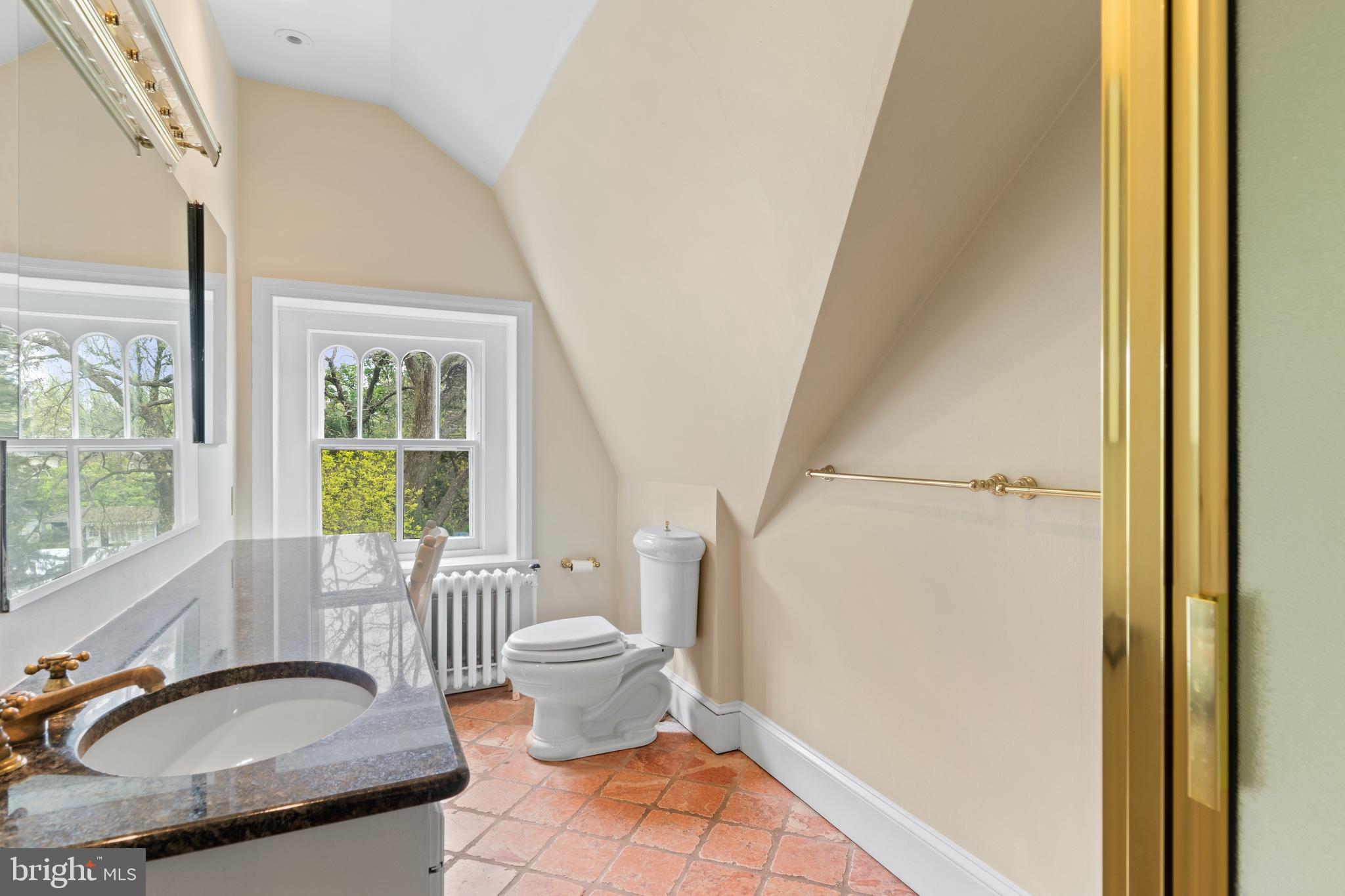 512 Dorset Road Devon, PA 19333 - Photo 45 of 48 a bathroom with a granite countertop sink and a mirror