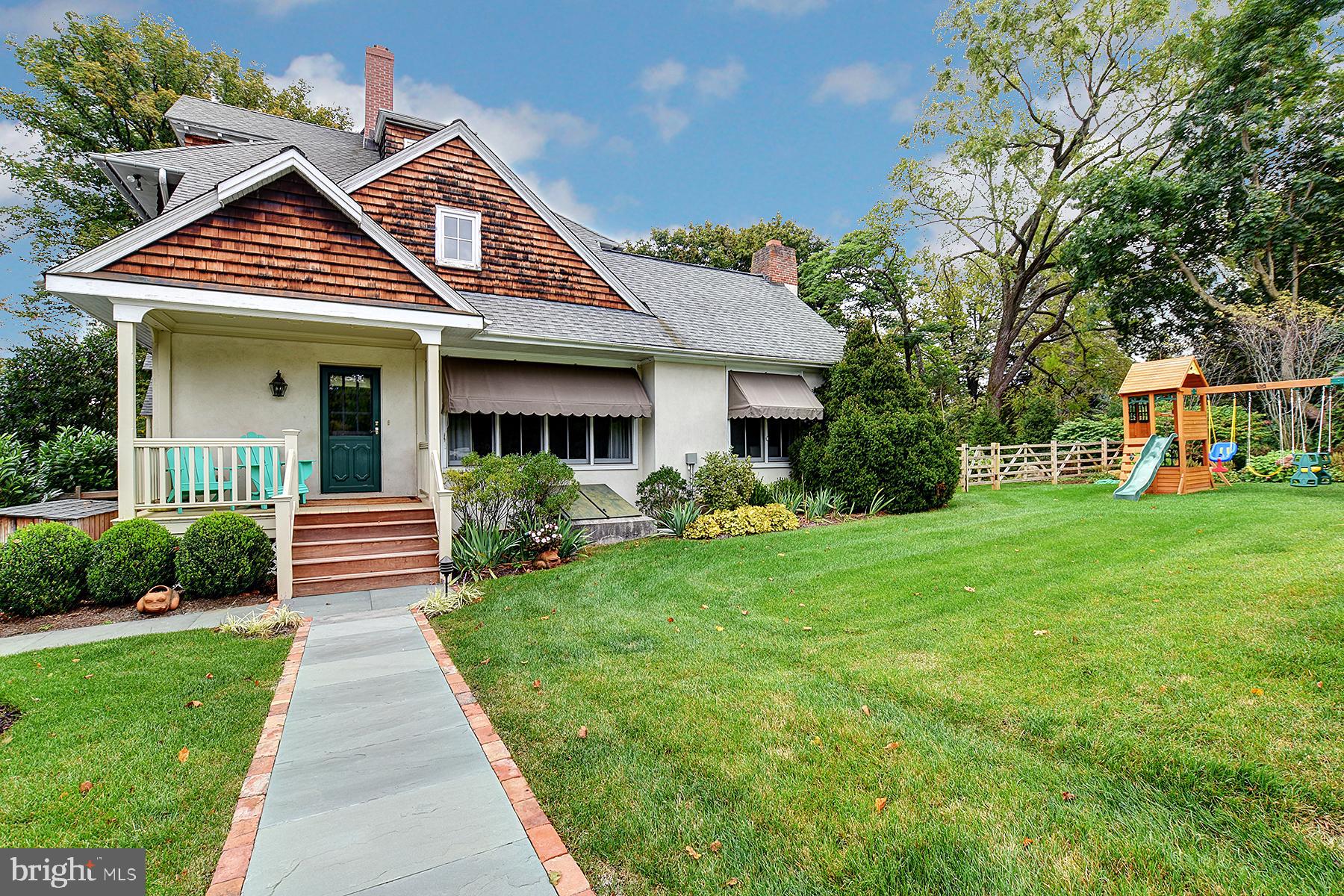 512 Dorset Road Devon, PA 19333 - Photo 6 of 48 a front view of a house with a yard