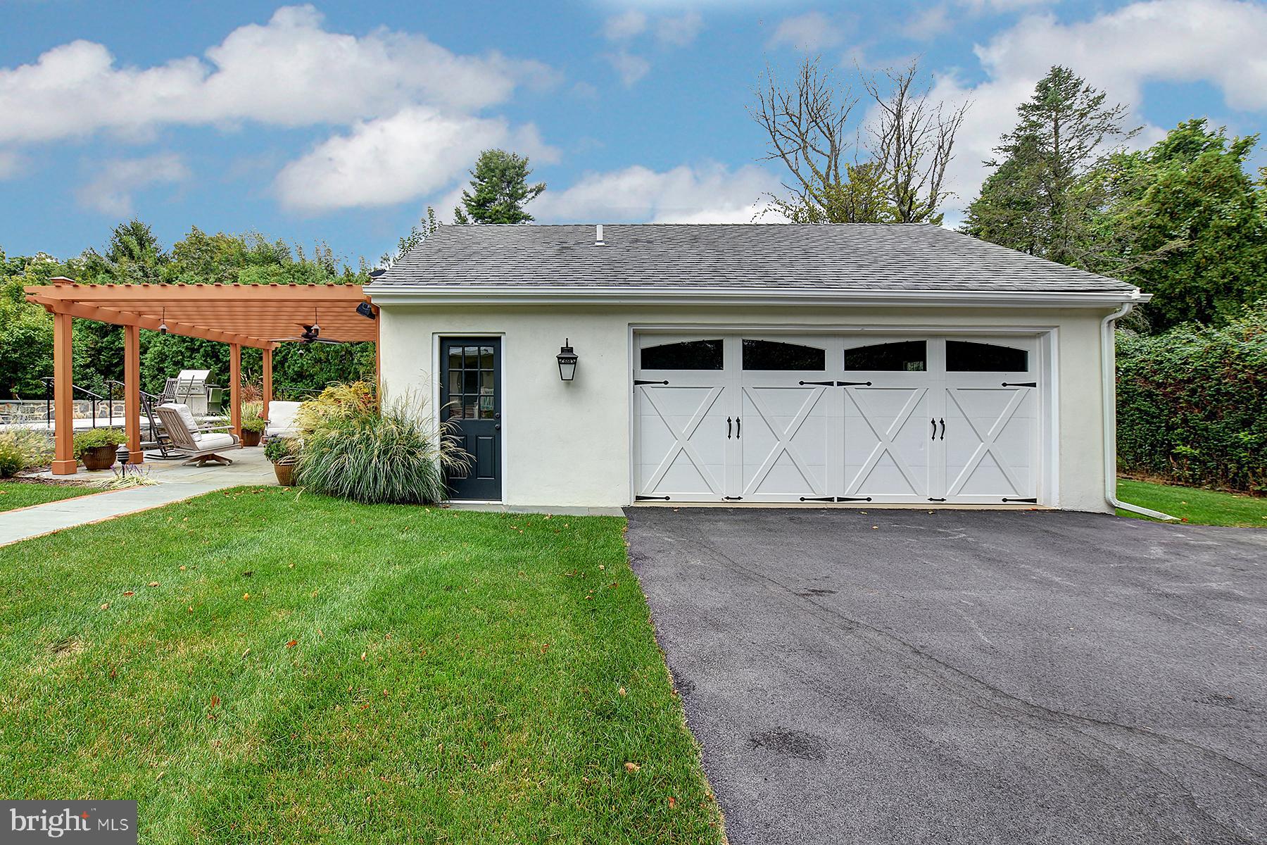 512 Dorset Road Devon, PA 19333 - Photo 9 of 48 a front view of a house with garden
