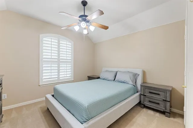 a spacious bathroom with a double vanity sink a mirror and a bathtub