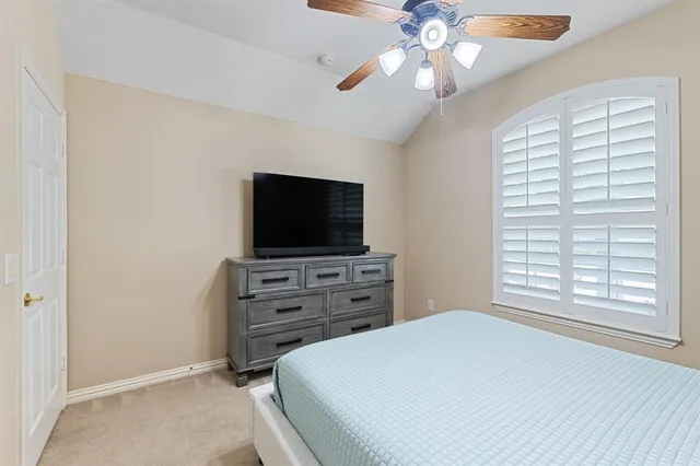 a bathroom with double sink and a mirror
