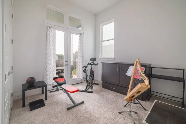 a view of a room with gym equipment