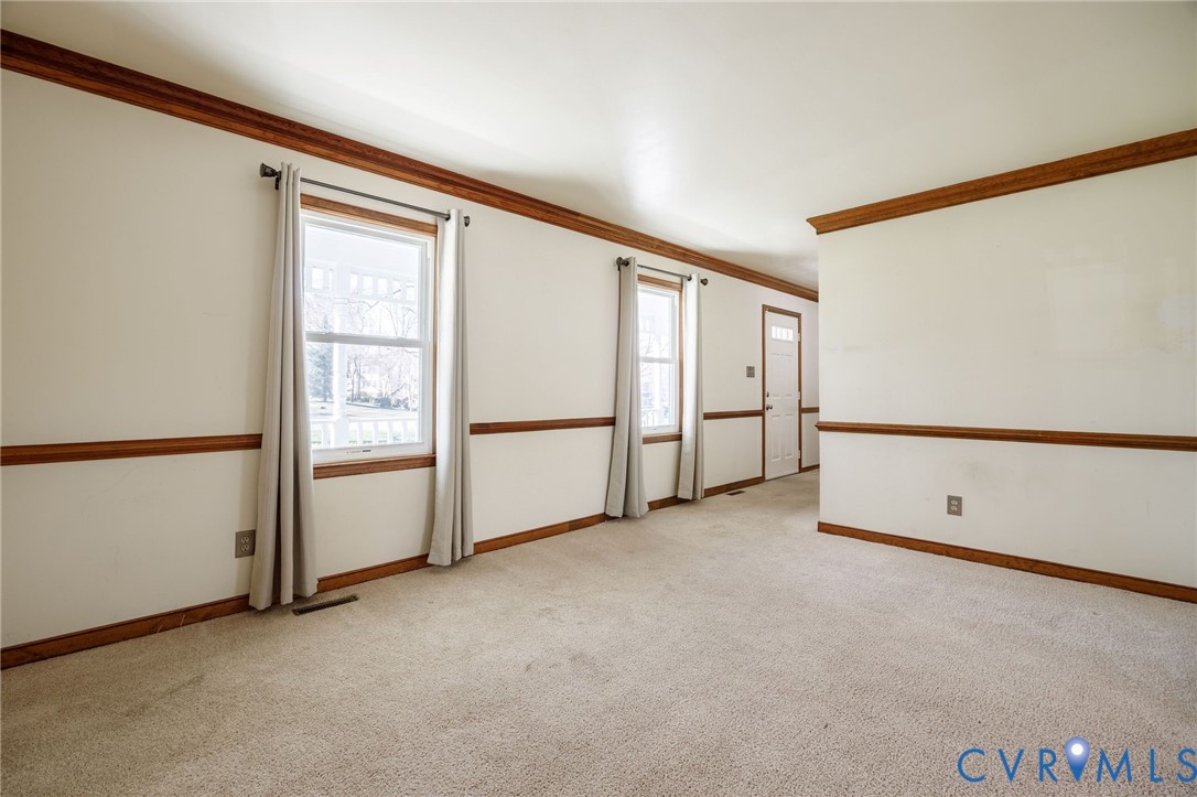 10400 Hamlin Drive Chester, VA 23831 - Photo 14 of 46 an empty room with windows