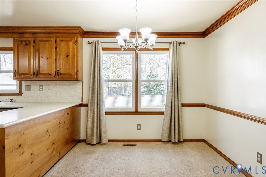 10400 Hamlin Drive Chester, VA 23831 - Photo 18 of 46 a view of an empty room with a window