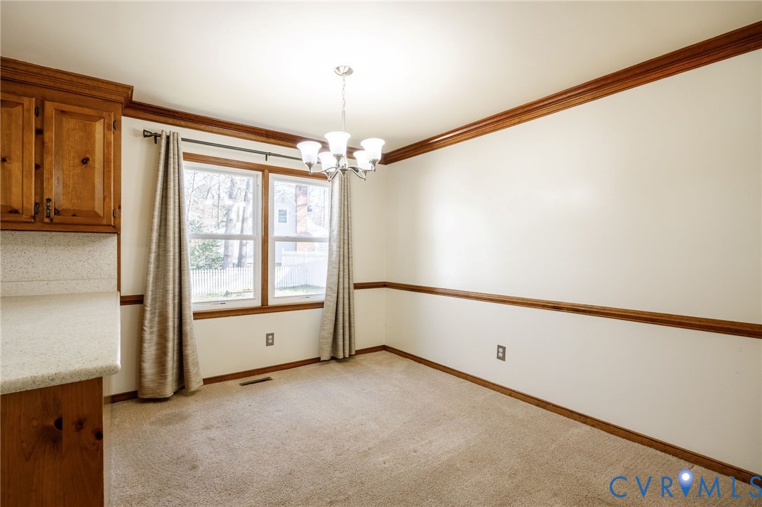 10400 Hamlin Drive Chester, VA 23831 - Photo 20 of 46 a view of an empty room with a window