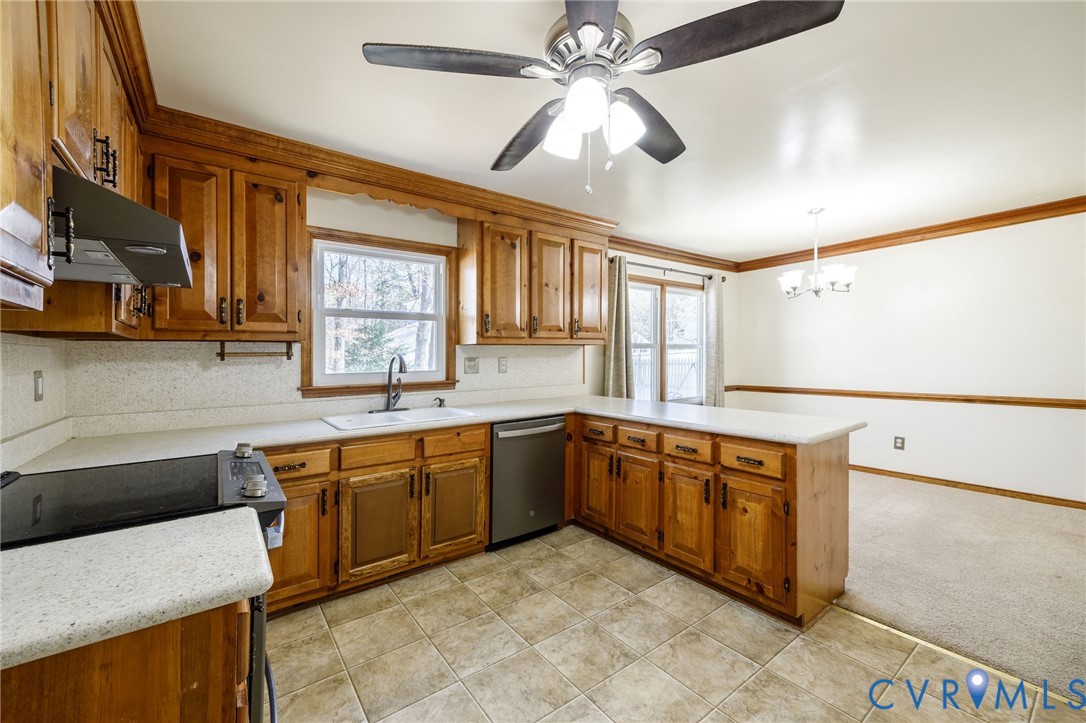 10400 Hamlin Drive Chester, VA 23831 - Photo 25 of 46 a large kitchen with stainless steel appliances granite countertop a sink and cabinets