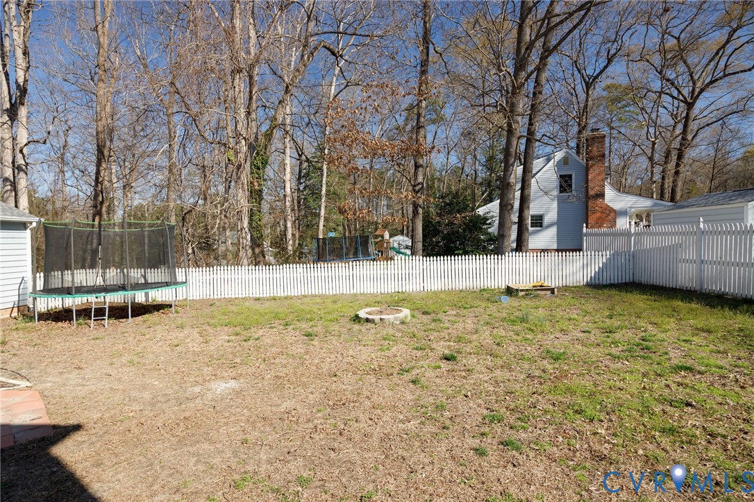 10400 Hamlin Drive Chester, VA 23831 - Photo 44 of 46 front view of a house with a yard