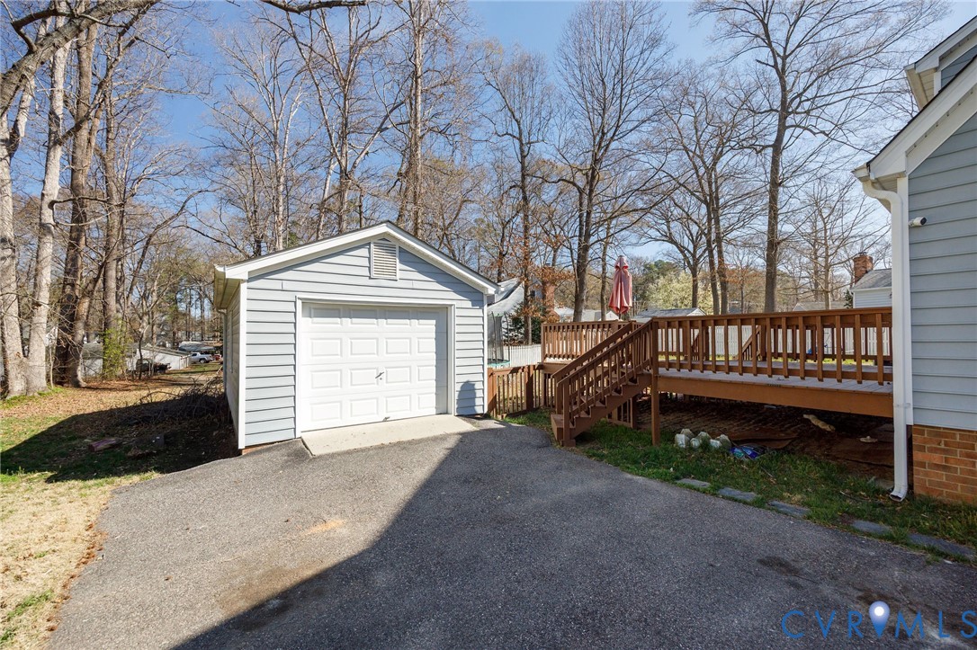 10400 Hamlin Drive Chester, VA 23831 - Photo 45 of 46 a view of a house with a yard and wooden fence