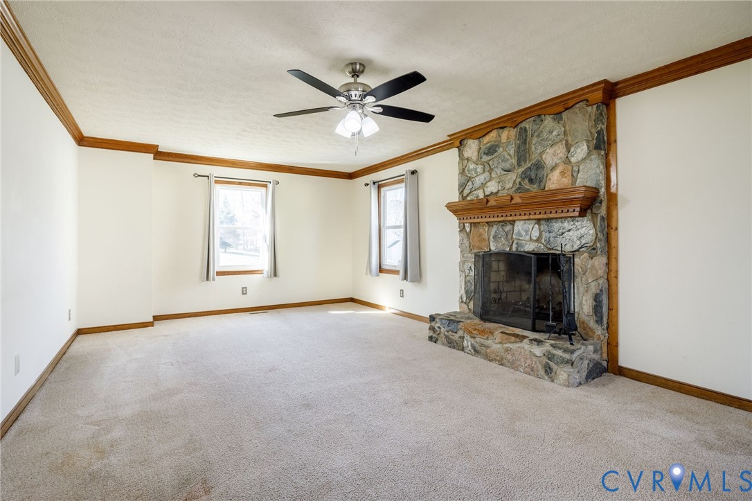 10400 Hamlin Drive Chester, VA 23831 - Photo 8 of 46 a view of empty room with a fireplace