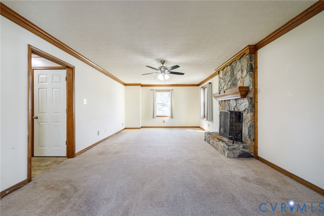 10400 Hamlin Drive Chester, VA 23831 - Photo 9 of 46 a view of a livingroom with a fireplace and window