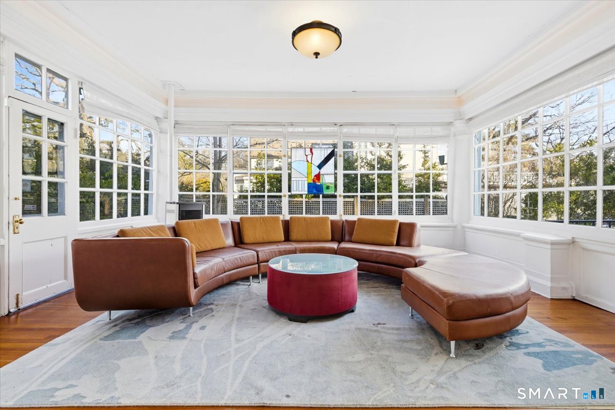 144 Edgehill Road Hamden, CT 06517 - Photo 39 of 40 Heated sunroom that overlooks bluestone patio and landscaped grounds