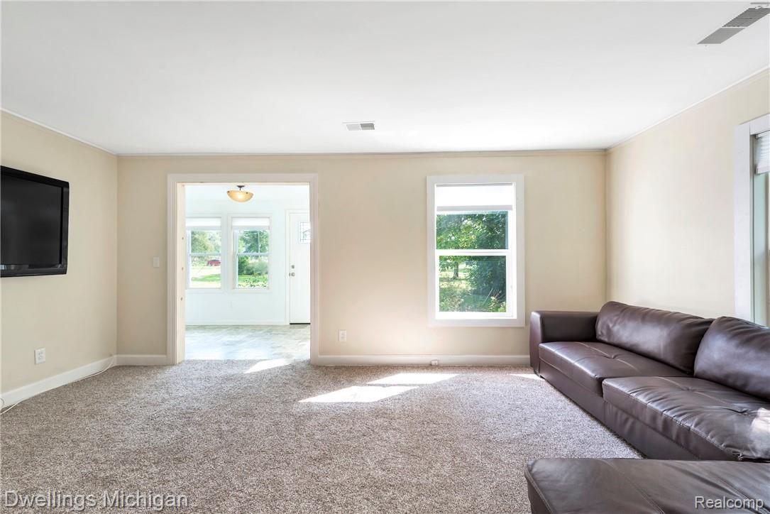 3648 Canton Ctr Road Canton, MI 48188 - Photo 13 of 40 Living Room & Enclosed Patio