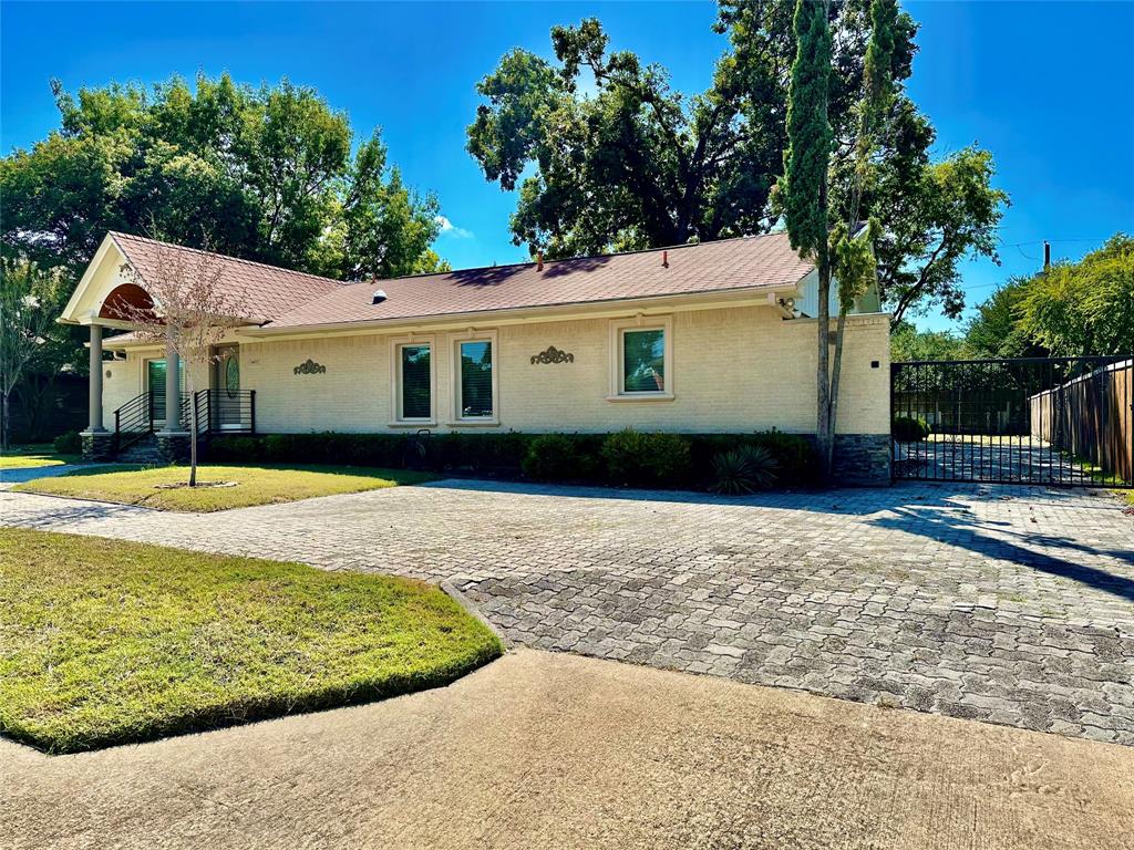 6632 Winding Rose Trail Dallas, TX 75252 - Photo 2 of 23 a view of a house with a backyard