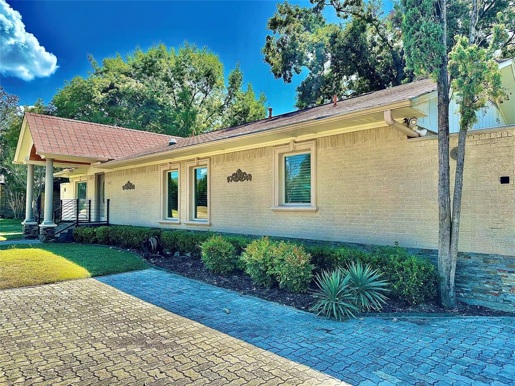 6632 Winding Rose Trail Dallas, TX 75252 - Photo 3 of 23 a view of a house with a backyard