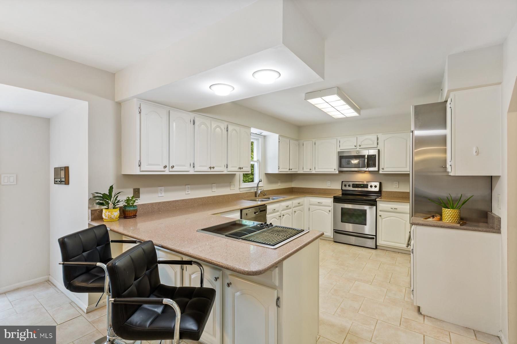 14504 Cutstone Way Silver Spring, MD 20905 - Photo 15 of 52 Large kitchen with stainless steel appliances