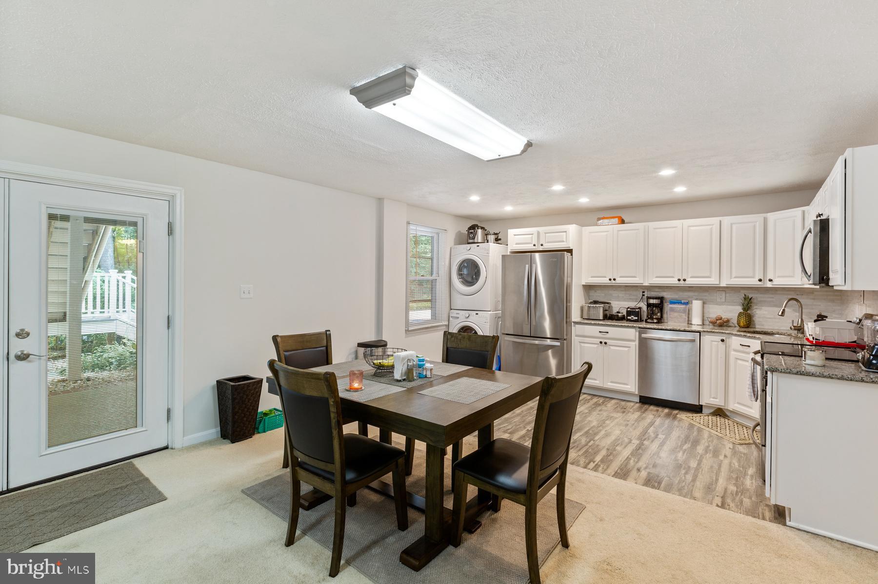 14504 Cutstone Way Silver Spring, MD 20905 - Photo 36 of 52 Finished basement with full kitchen area