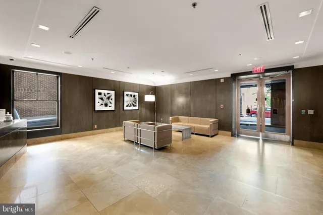 a living room with furniture and window