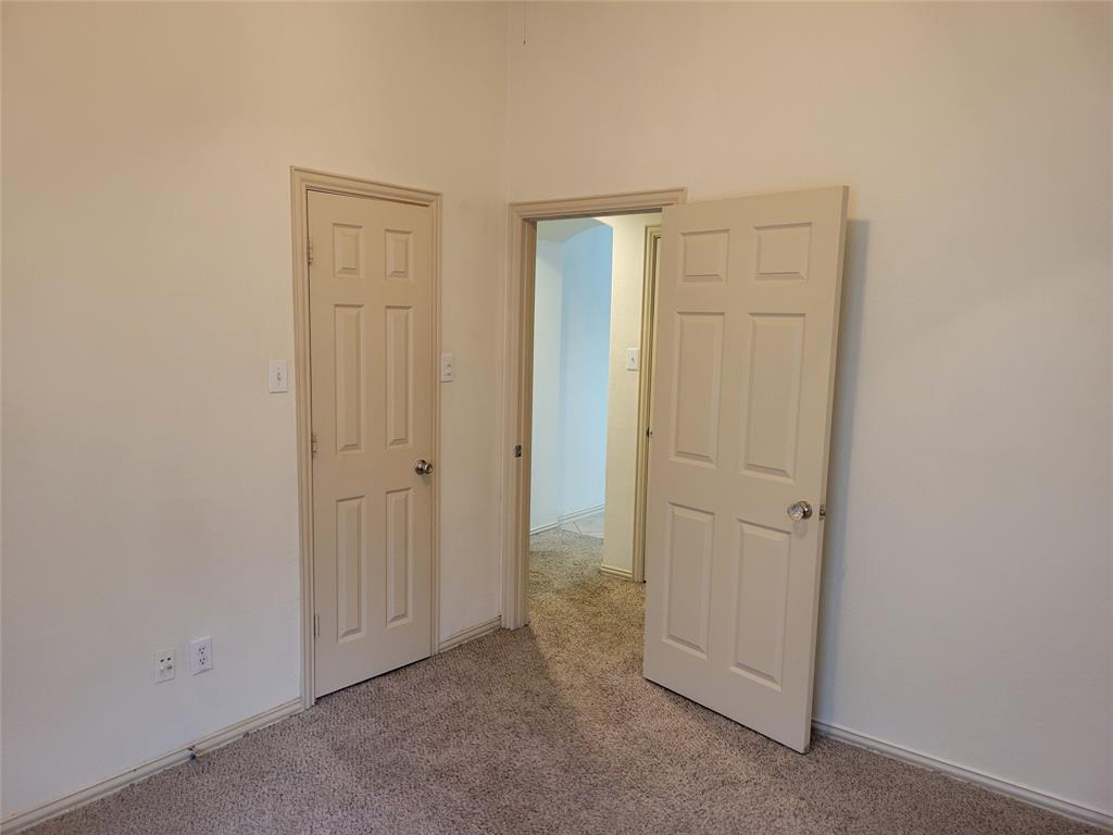 508 Hummingbird Drive Little Elm, TX 75068 - Photo 11 of 14 an empty room with closet area