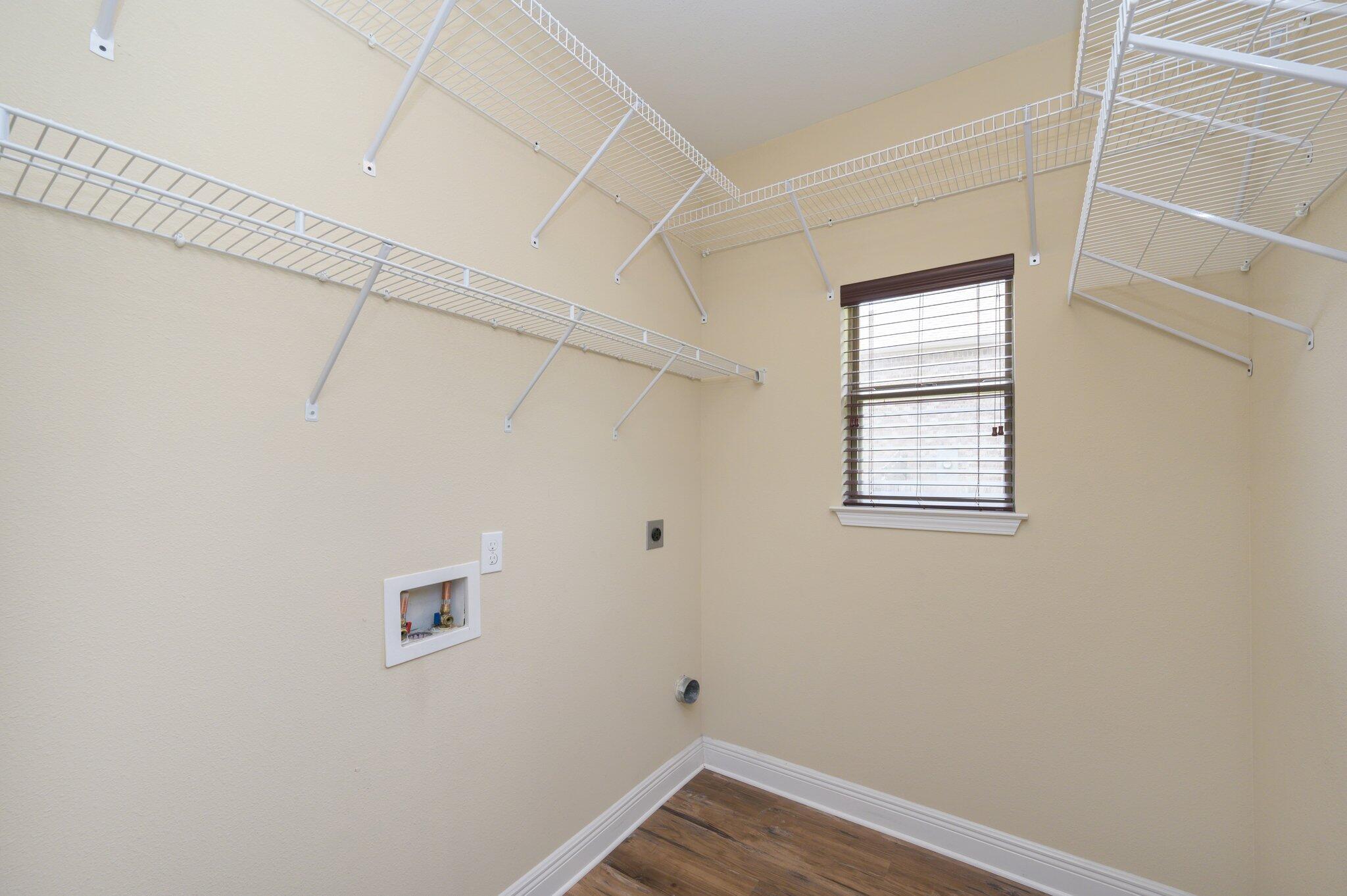 714 Lime Lane Crestview, FL 32536 - Photo 34 of 47 a view of a room with rack on the wall and a window