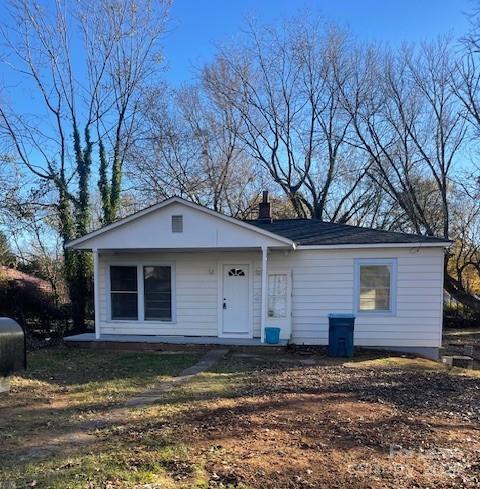 1831 13th Avenue Southwest Hickory, NC 28602 - Photo 2 of 9 a front view of a house with a yard