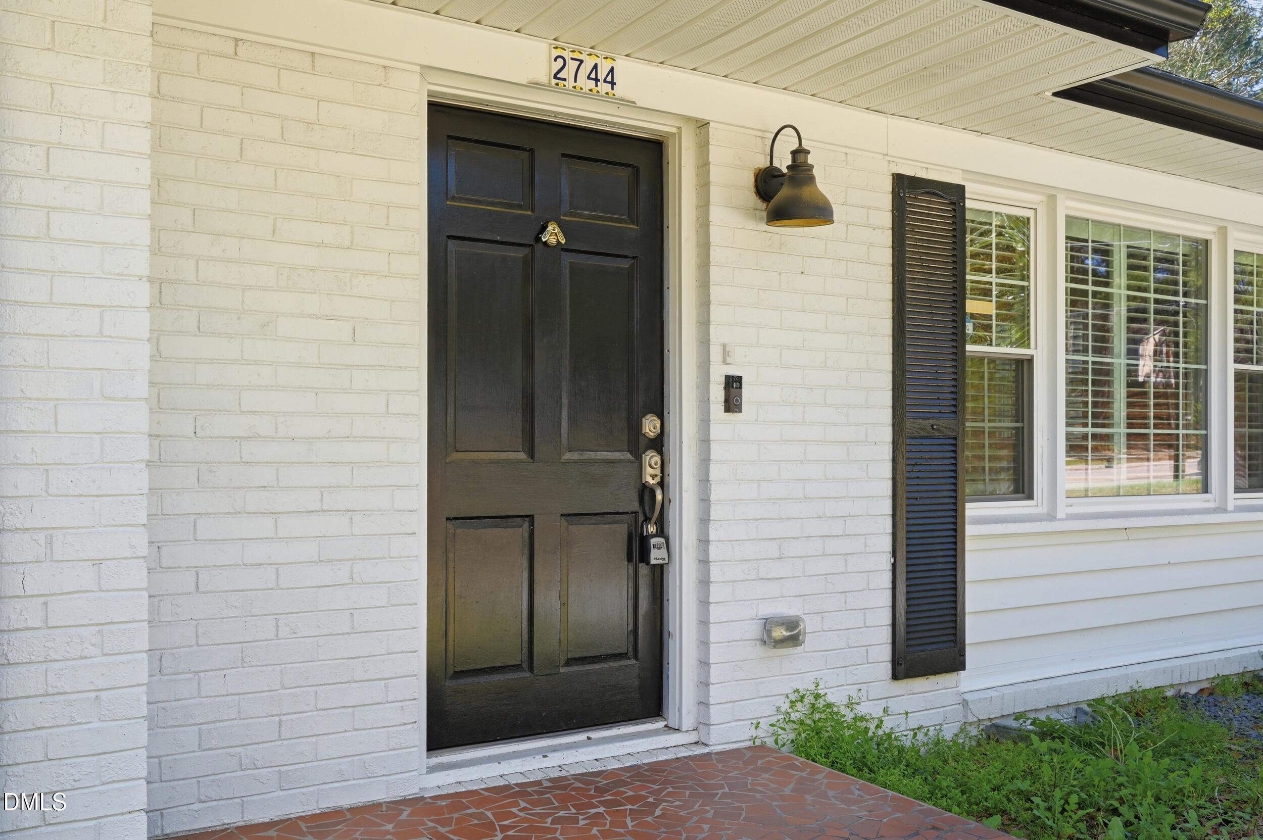 2744 Milburnie Road Raleigh, NC 27610 - Photo 1 of 33 front door