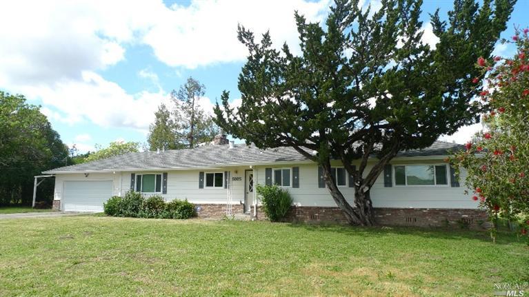 3085 Marc Way Santa Rosa, CA 95403 - Photo 1 of 1 a front view of a house with a garden