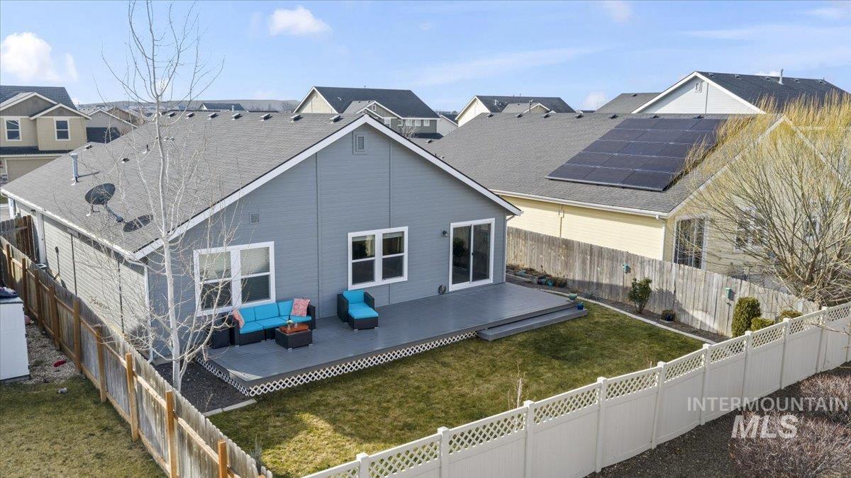 1138 East Shady Ridge Drive Kuna, ID 83634 - Photo 28 of 31 featuring a fenced backyard and a TREX deck