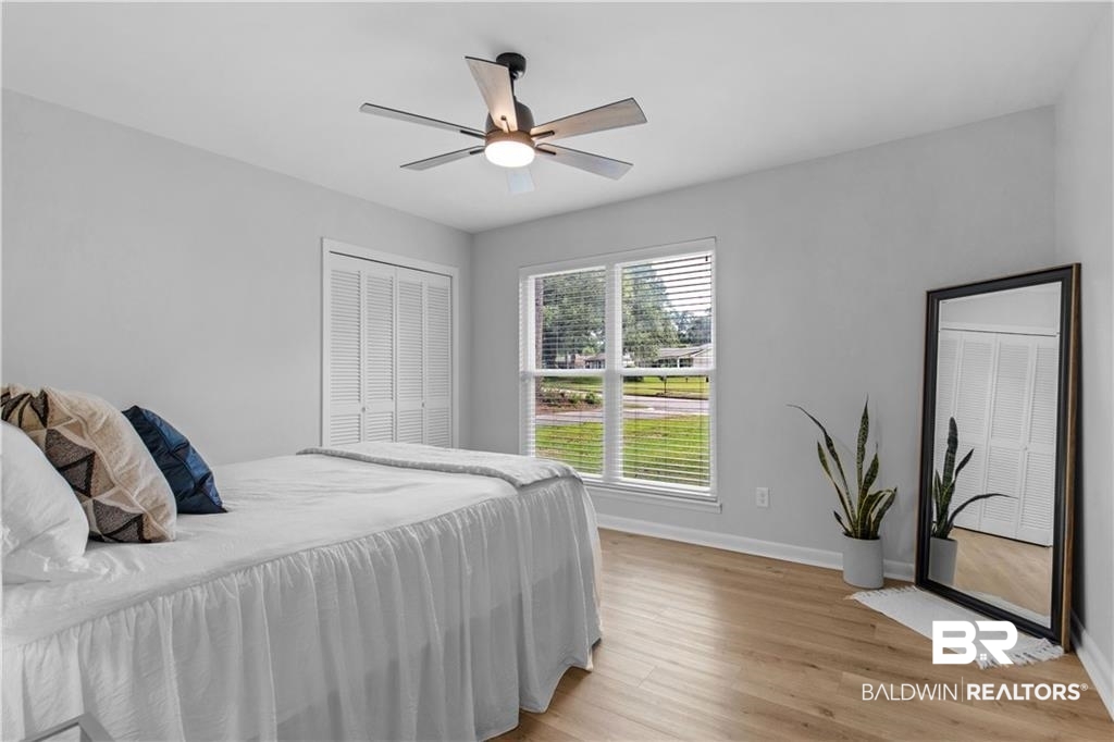 1624 Apex Drive Mobile, AL 36693 - Photo 19 of 29 Bedroom with light wood-type flooring and ceiling fan
