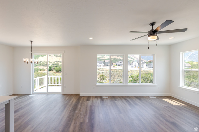 195 West Harmony Rdg Parkway, Unit 601 Mapleton, UT 84664 - Photo 10 of 23 Spacious interior featuring wood-finish flooring, recessed lighting, and a ceiling fan