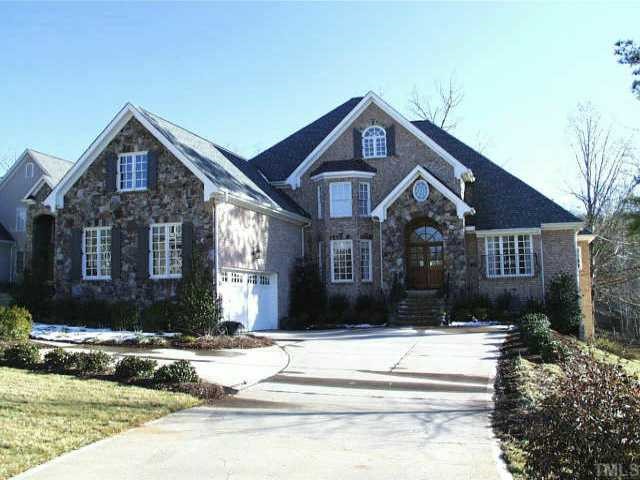 9501 Swepstone Lane Raleigh, NC 27615 - Photo 1 of 1 a front view of a house with a yard