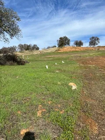 a view of a houses with a yard