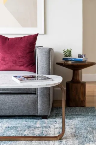 a kitchen with a stove a sink and a refrigerator