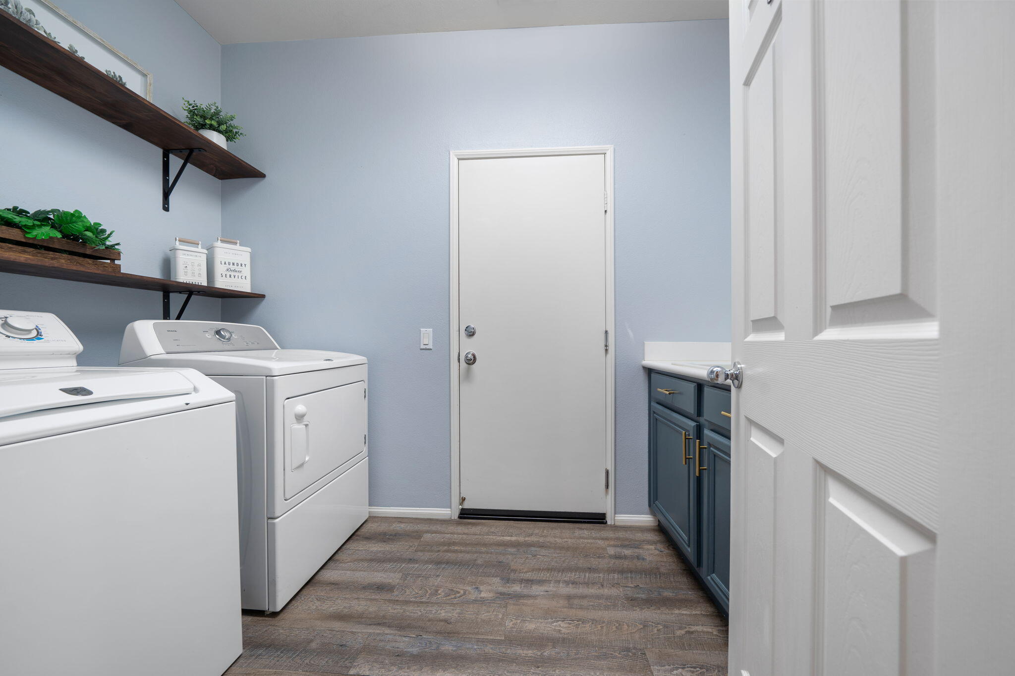 80219 Maramar Drive Indio, CA 92203 - Photo 38 of 41 a view of storage and utility room with washer and dryer