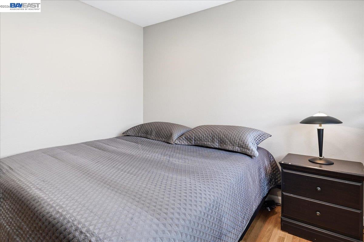 2861 Millbridge Place San Ramon, CA 94583 - Photo 34 of 58 a bedroom with a bed and a lamp