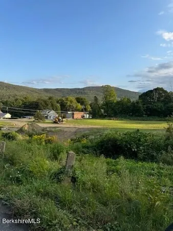 a view of outdoor space with mountain view