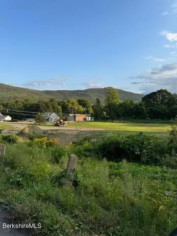 a view of outdoor space with mountain view