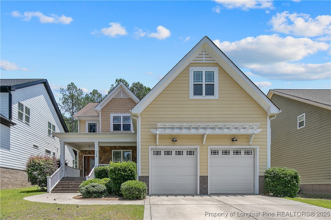 716 Micahs Way North Spring Lake, NC 28390 - Photo 1 of 50 a front view of a house with yard