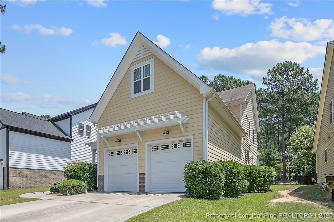 716 Micahs Way North Spring Lake, NC 28390 - Photo 2 of 50 a view of a house with a yard