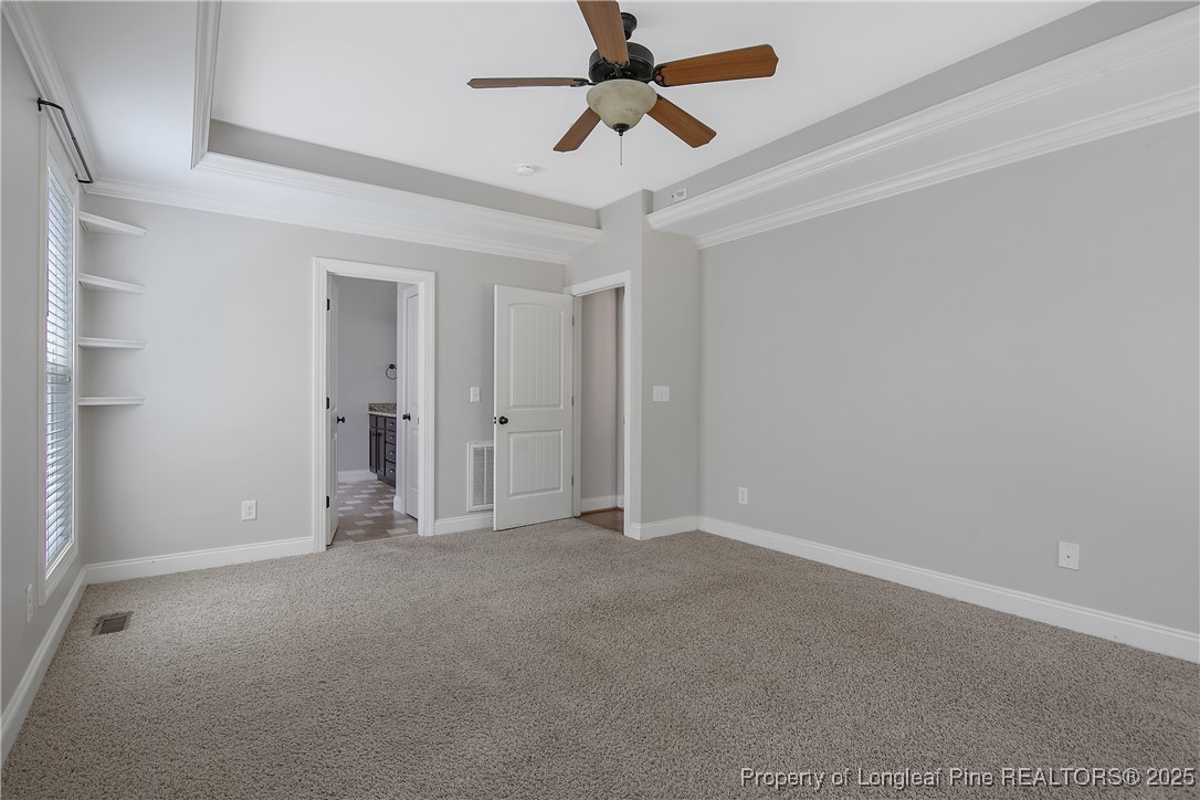 716 Micahs Way North Spring Lake, NC 28390 - Photo 28 of 50 a view of empty room with ceiling fan