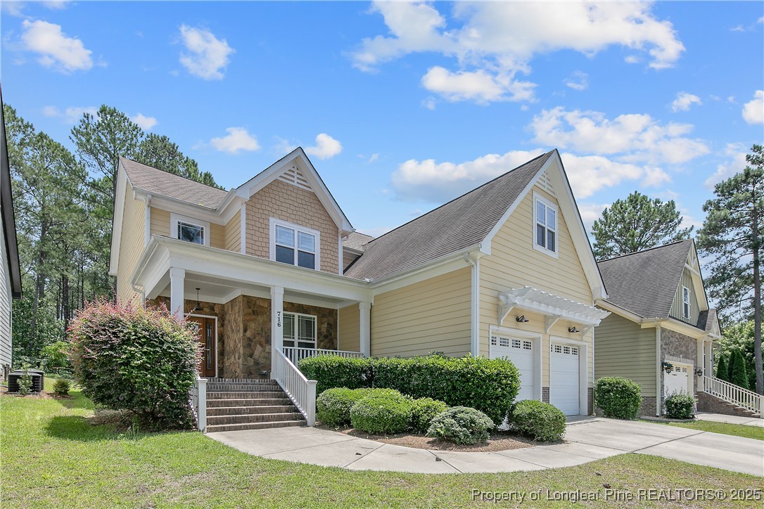 716 Micahs Way North Spring Lake, NC 28390 - Photo 3 of 50 a front view of a house with a yard