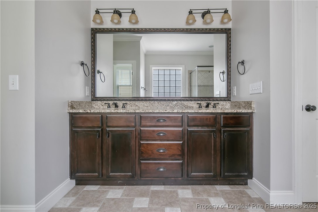 716 Micahs Way North Spring Lake, NC 28390 - Photo 31 of 50 a view of a kitchen with stove and cabinets
