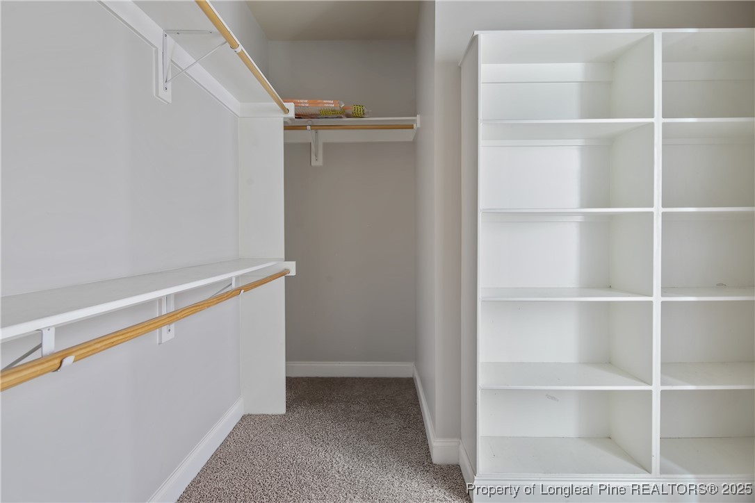 716 Micahs Way North Spring Lake, NC 28390 - Photo 34 of 50 a view of an empty walk in closet