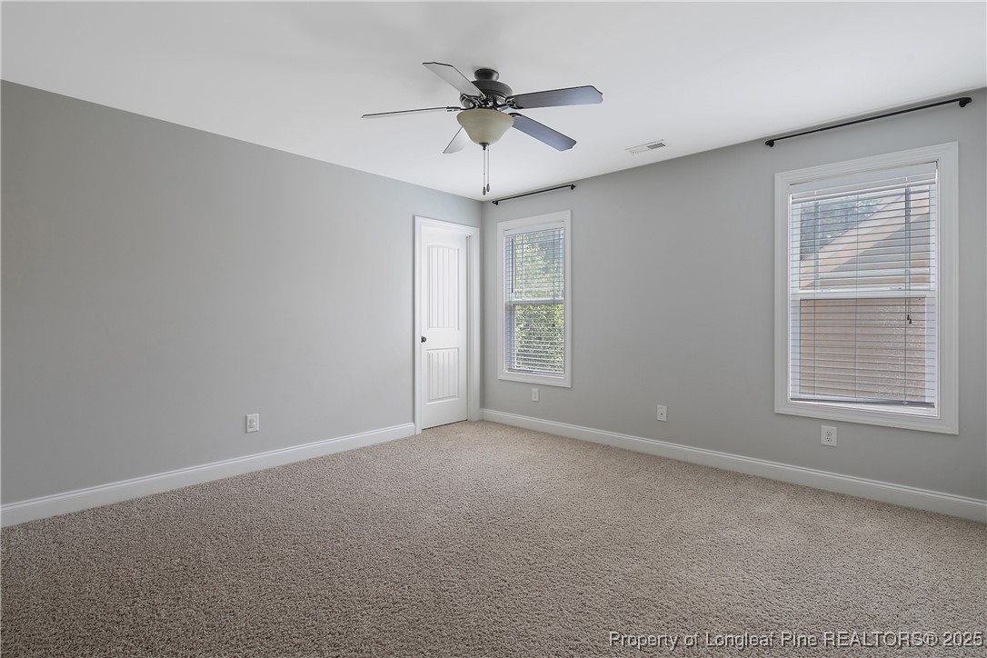 716 Micahs Way North Spring Lake, NC 28390 - Photo 41 of 50 a view of an empty room with a window
