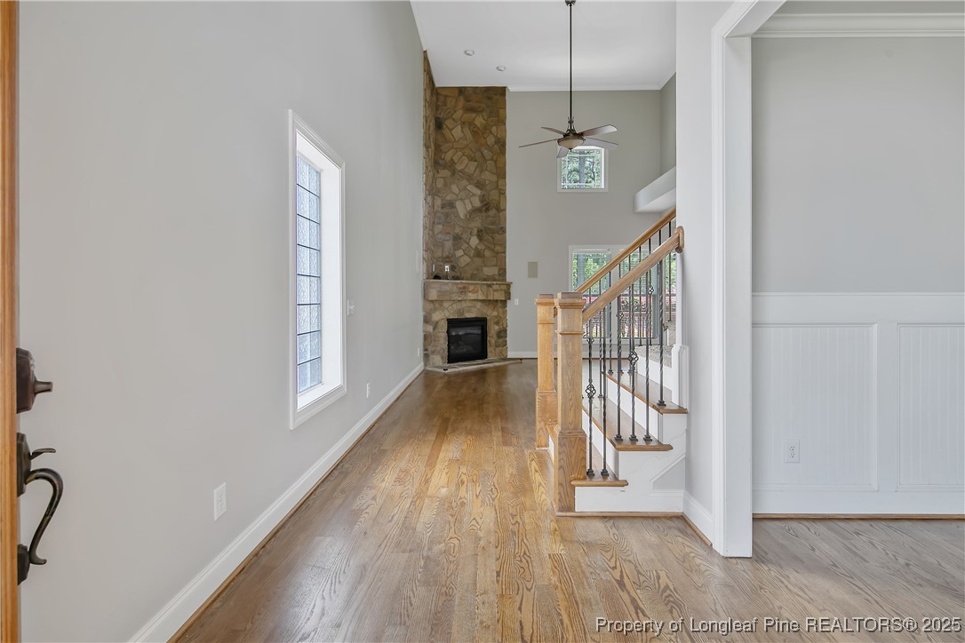 716 Micahs Way North Spring Lake, NC 28390 - Photo 5 of 50 a view of entryway and hall with wooden floor