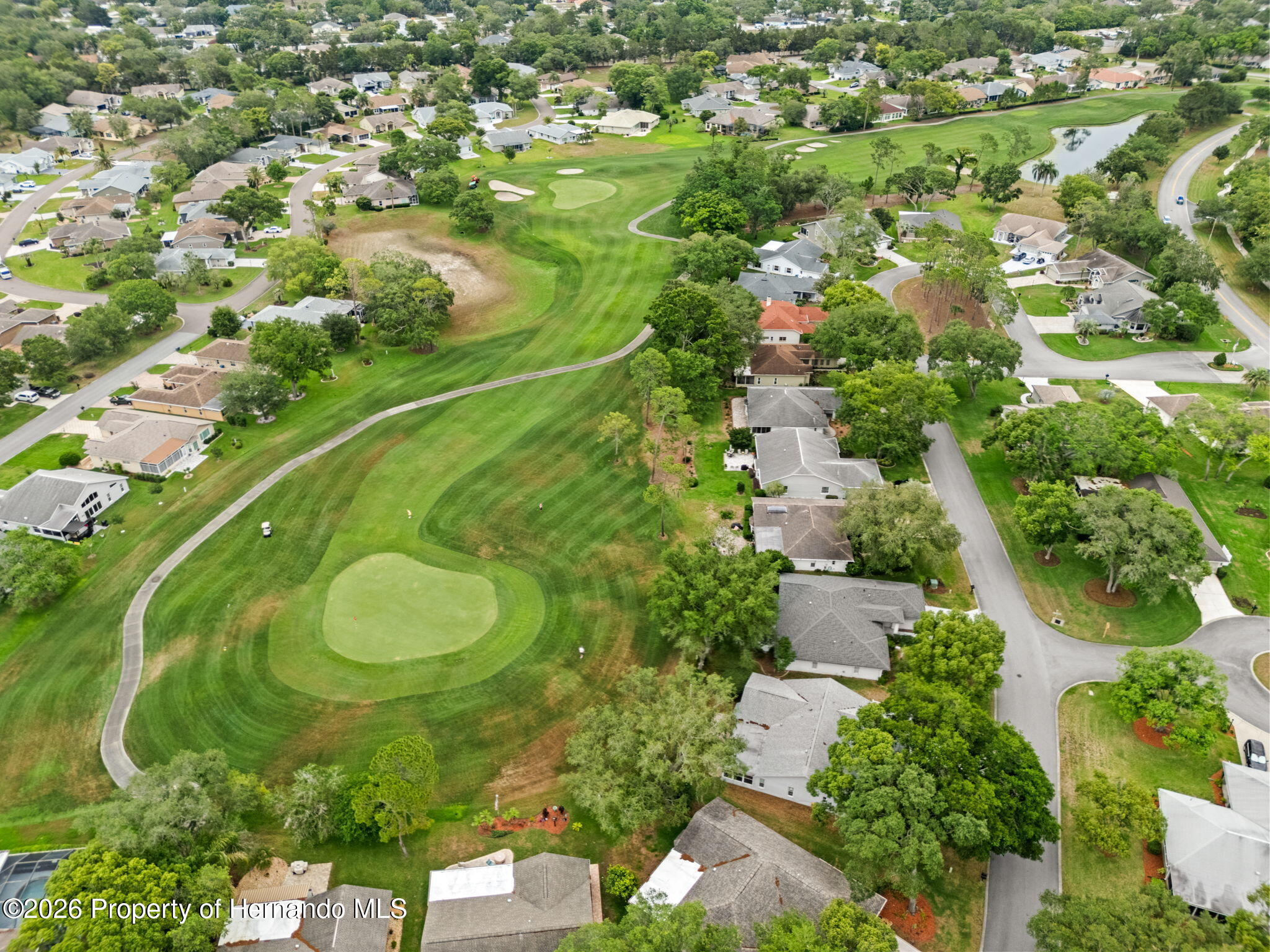 3072 Eagle Bend Road Spring Hill, FL 34606 - Photo 60 of 115 Aerial View of the Green behind the home.